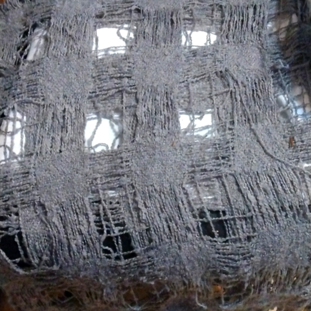 Long grey shawl with fringe all around big square holes